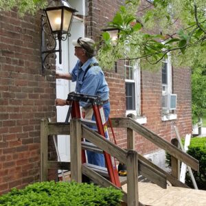 Charlie installing door