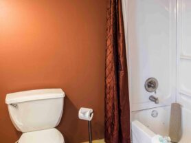 bathroom with red walls